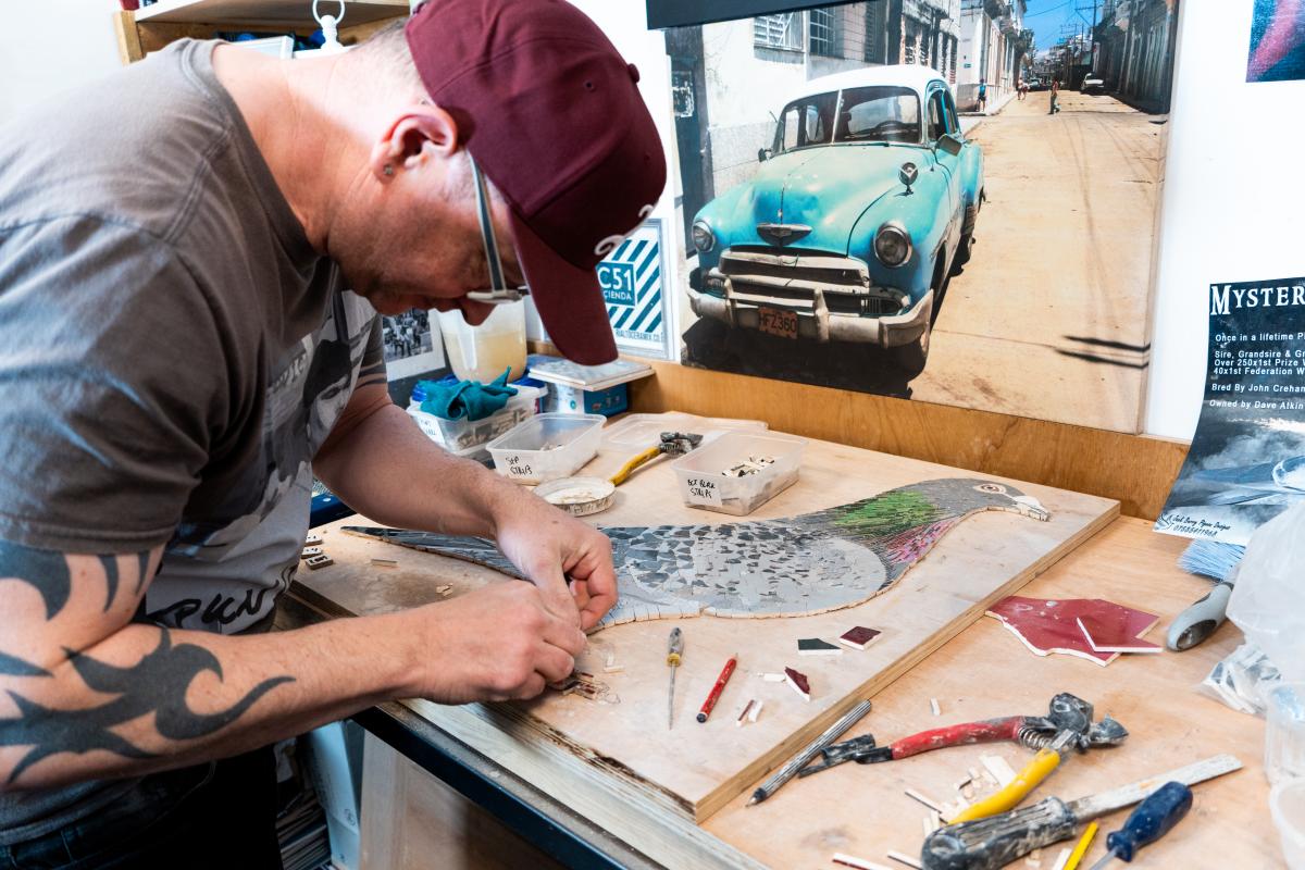 Mosaic artist at work in their studio